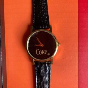 “Coke” black leather and gold-tone Women’s watch